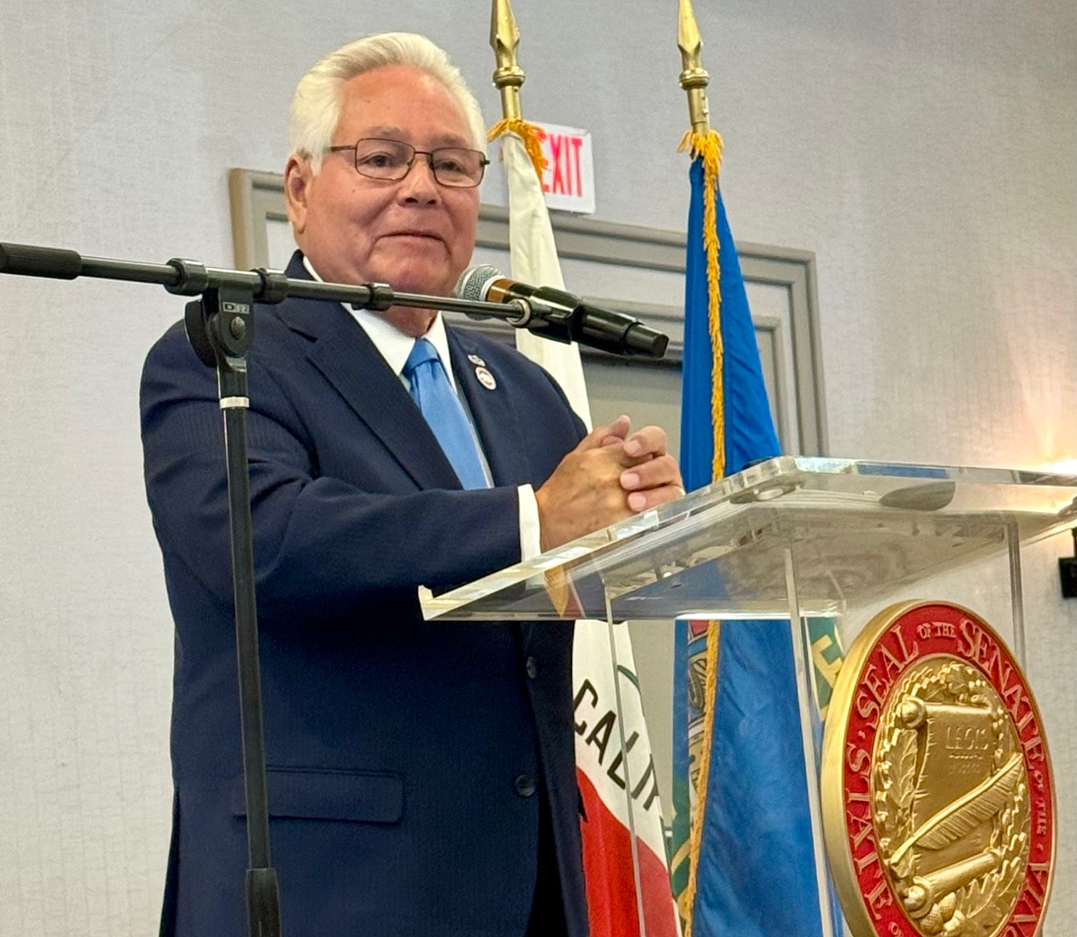 Senator Bob Archuleta at the podium presenting his State of the State Address to about 200 government officials